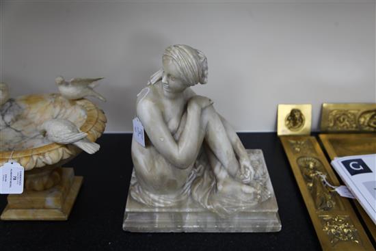 A 19th century Italian alabaster figure of The Bather, 14in.